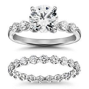 A bridal set with matching side stones where the diamonds are similar but not perfect.